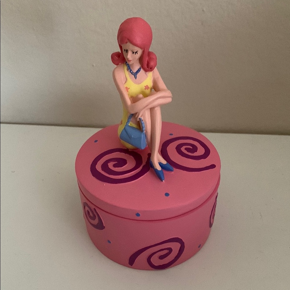 Pink Box with Figurine and Swirl Design